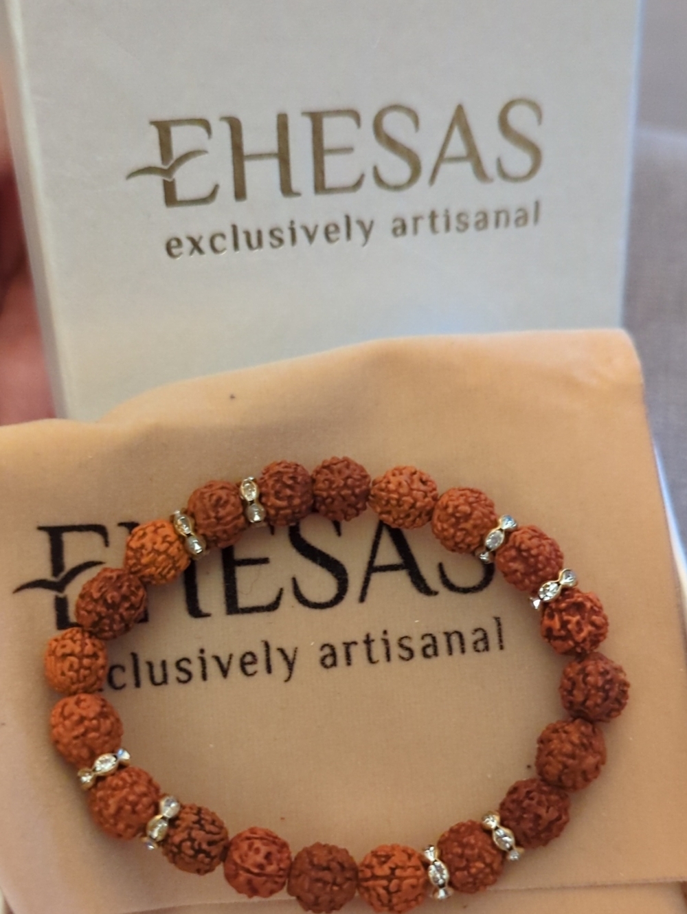 SAS Orange Rudraksha Bead Bracelet with Gold Accents